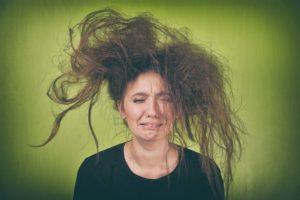 Woman with dry crazy looking hair
